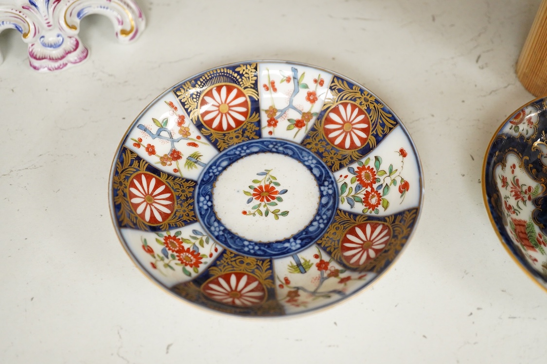 A Worcester Queen Charlotte pattern plate, Worcester scale blue coffee cup and teabowl, two French porcelain scale blue saucers, a fruit painted oval dish and a model of a boy emblematic of winter-19cm high